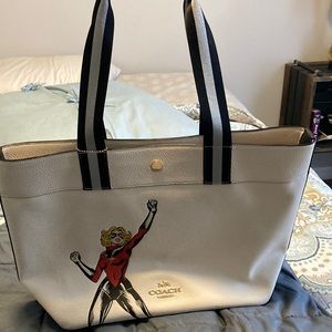 Beautiful large Captain Marvel coach tote with original Carol Danvers on it.